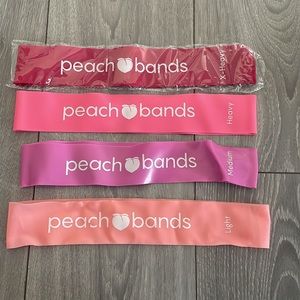 Peach resistance bands in Light, Medium, Heavy and X-Heavy